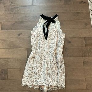 Bridal white lace romper. Perfect Tiffany bow in black lace. Bridal and Parisian